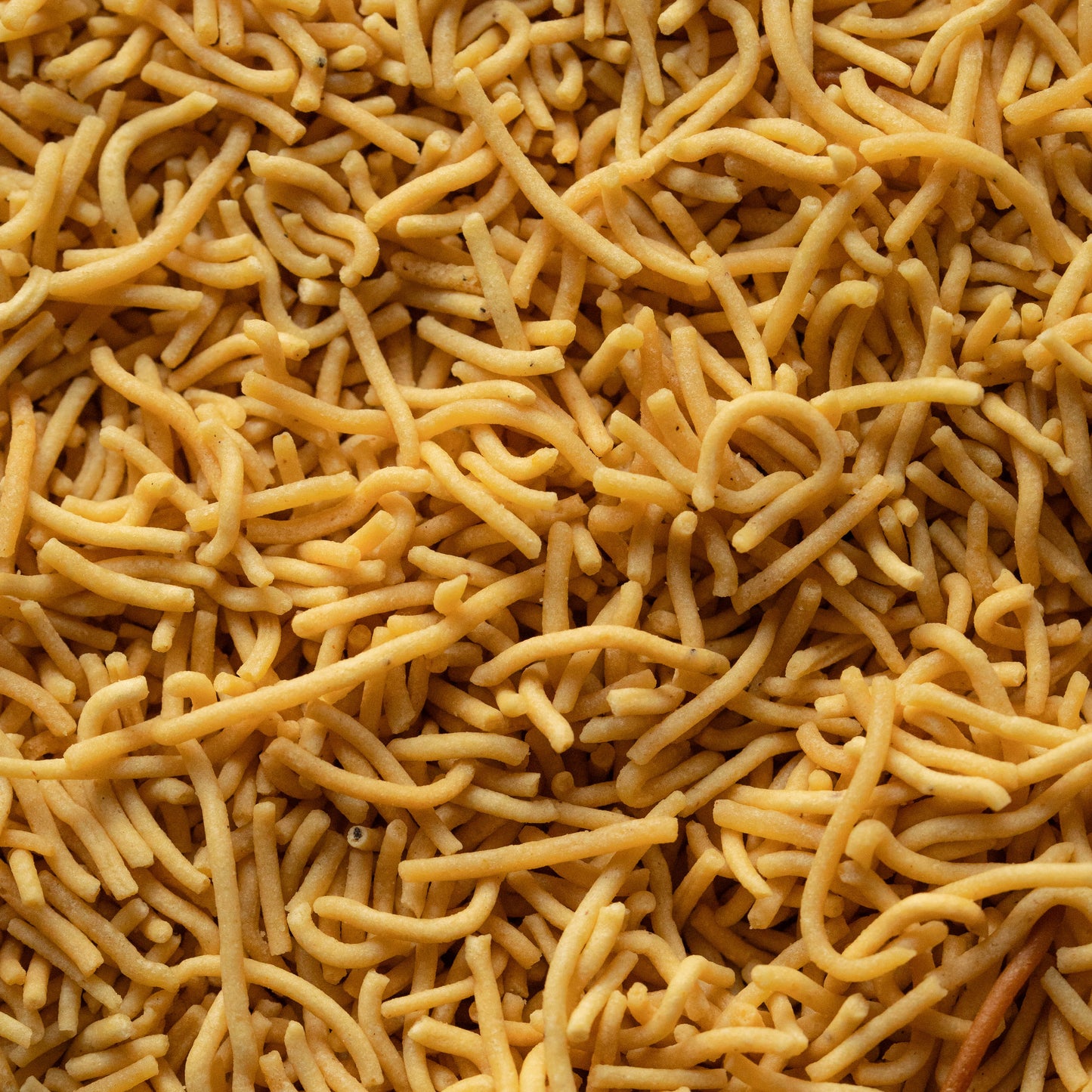 Close-up showing crunchy texture of roasted Bhujia – high-fibre snack